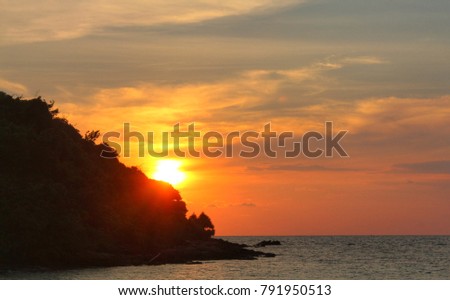 The sun shines in the sea at dusk, East Thailand