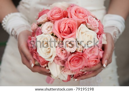 wedding bouquet of pink and white roses