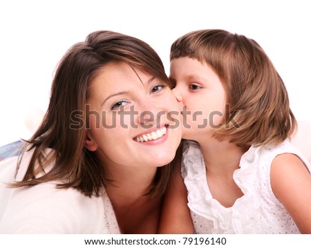 A portrait of a little girl kissing her mom over white background