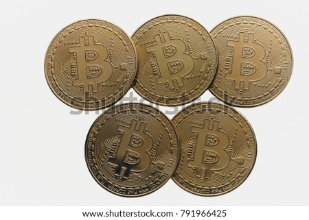 Golden bitcoin coin on black background. 
