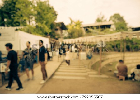 Abstract blur people in garden village day festival bokeh background - vintage festival outdoor fair