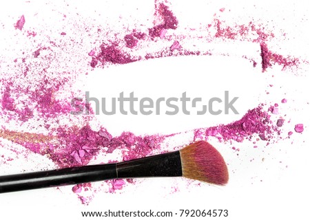 Traces of vibrant pink blush and eye shadow, forming a frame, with a makeup brush. A design template for a makeup artist's business card or flyer design, with copy space