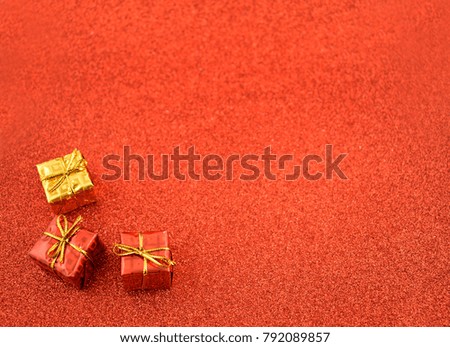 Red festive background stock images. Red holiday background with presents. Christmas gift boxes. Red decorations on shiny background with copy space for text