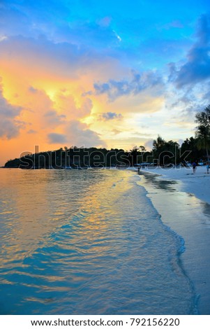 Beautiful sky in the sunset. On the famous beach.Travelers want to visit.At pataya beach koh lipe island Thailand. Royalty-Free Stock Photo #792156220