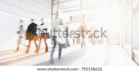 Blurred business people at a trade show
