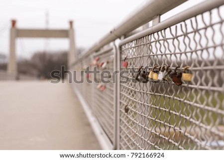 Various love padlocks locked to a bridge, Vienna Austria