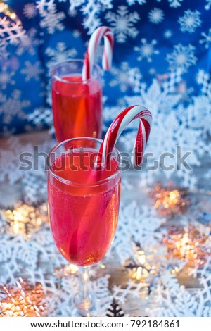 festive Christmas drinks with candy canes and snowflakes