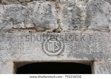 Entrance over the gateway of a medieval building in the centre of the old town of Kotor, Montenegro