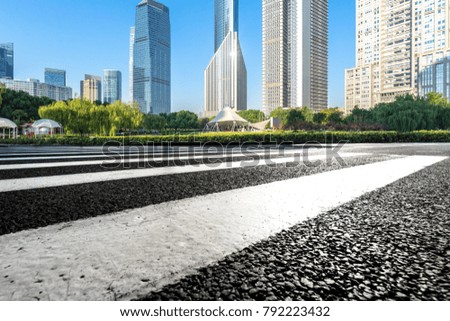 Panoramic skyline and buildings with empty road in shanghai