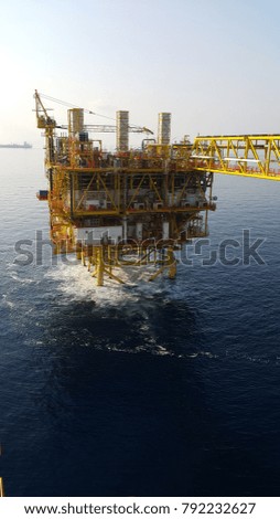 Oil and gas platform middle the ocean.