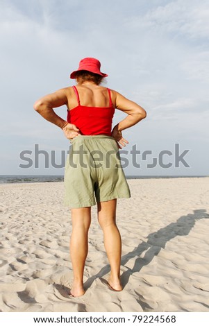 	Woman on the beach.