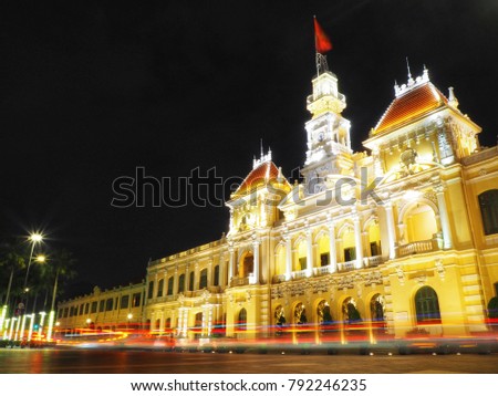 Night landscape view Ho Chi Ming city hall or Ho Chi Minh city people's committee. Low shutter speed effect.
