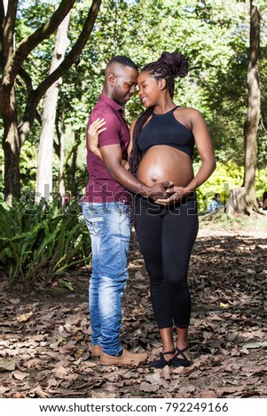 happy pregnant African-American couple