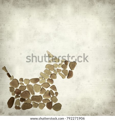 textured old paper background with dog figure made of sea glass