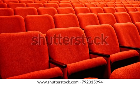                 Red stage seats in a row               