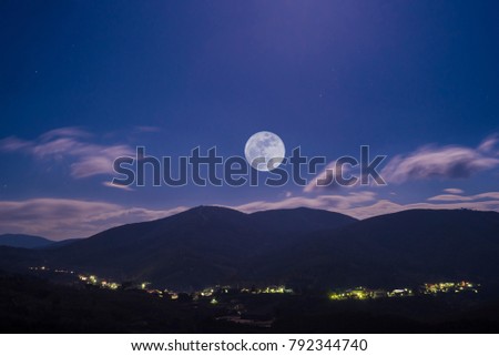 full moon night over small town Las Hurdes