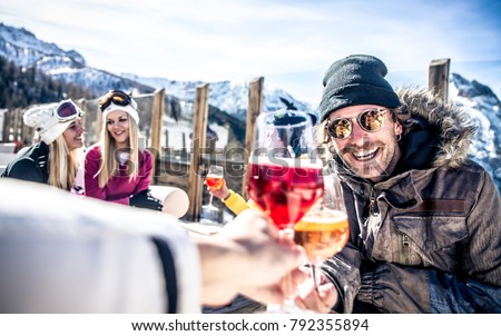 Group of friends having fun in a ski resort