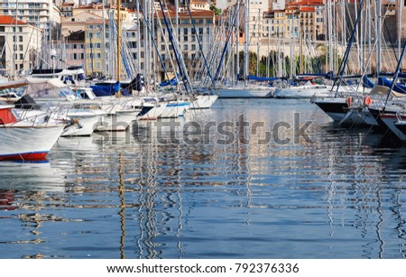 Yachts in the port, Sailing boats waiting on marina parking of modern motor boats and blue water