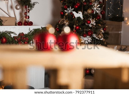 Red Christmas Balls on Wooden Table in December, Winter Holiday Concept, Selective Focus
