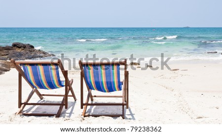 beach chair on white sand beach