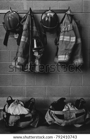 Firefighter gear with fire hoses and truck