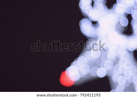 blurry picture of Christmas lights for background, filtered tones