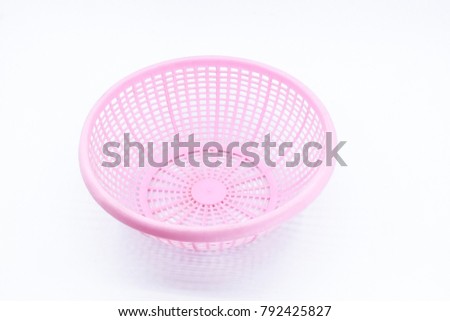 White background of pink basket 