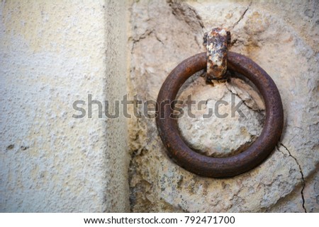 Close Up of a Medieval Steel Ring for Parking Mules Near the Wall on the Street. Matera, South of Italy