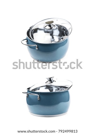 Steel green stock pot with a glass lid, composition isolated over the white background, set of two different foreshortenings