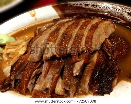 Duck roast on the plate, delicious Chinese food.
