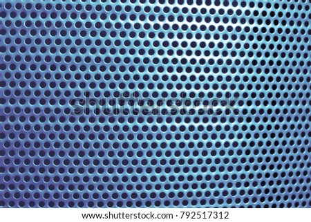 blue steel surface with little round holes