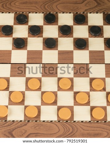 checkerboard with checkers. game concept.board game.hobby.checkers on playing field for a game