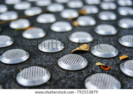 Metal tactile paving tiles for the blind. Care for the disabled
