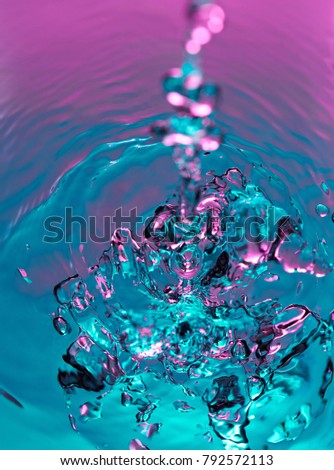 Absract colorful wallpaper background. Clear water splash frozen motion