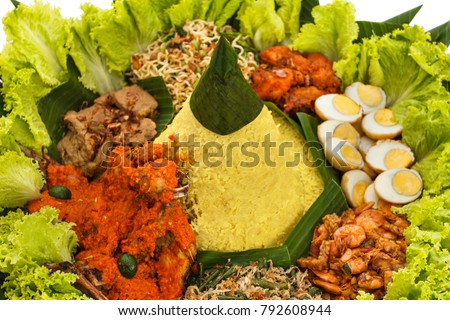 portrait of indonesian cuisine nasi tumpeng for celebration Royalty-Free Stock Photo #792608944