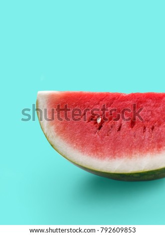 close up portrait of fresh watermelon on pastel green background
