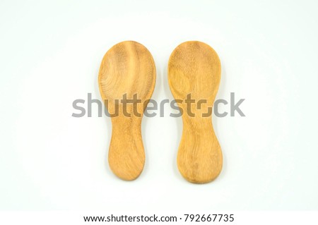 Wooden spoon on white background of file with Clipping Path .