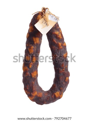 Homemade Smoked sausages with label. The mass and date of made are sign on the label. Isolated on white background.