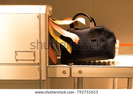 Bag through the scanner. Royalty-Free Stock Photo #792755653