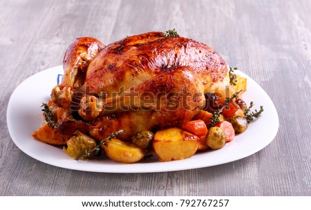 Roast chicken with brussel sprouts, carrot and potato Royalty-Free Stock Photo #792767257