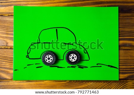 Car drawn on paper