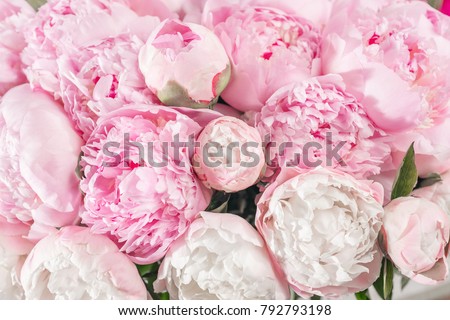 Elegant bouquet of a lot of peonies of pink color close up. Beautiful flower for any holiday. Lots of pretty and romantic flowers in floral shop. Royalty-Free Stock Photo #792793198