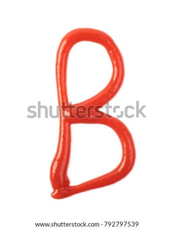 Single latin letter B made of food sauce isolated over the white background