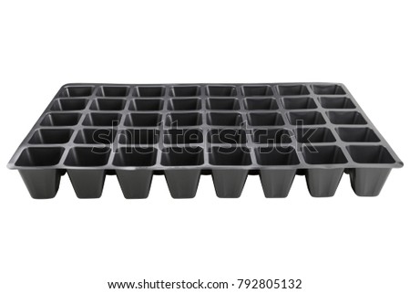 plastic product, tray for seedlings, black tray on white background isolated