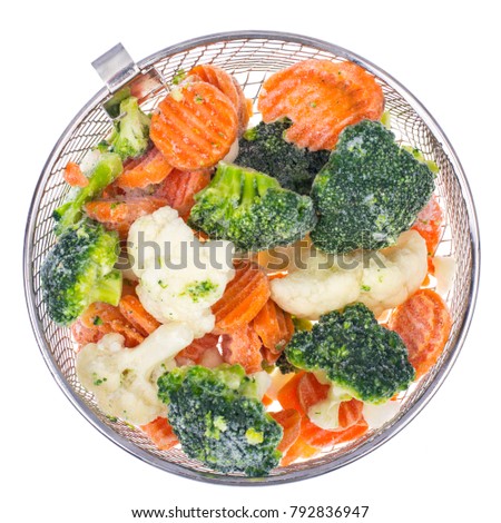Mix of frozen vegetables on white background. Studio Photo