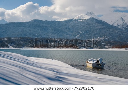 Lake Plastiras in Greece snowy captured. 