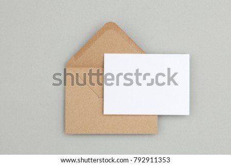 Blank white card with kraft brown paper envelope template mock up Royalty-Free Stock Photo #792911353