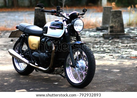 Picture of classic motorcycle in side view. Royalty-Free Stock Photo #792932893