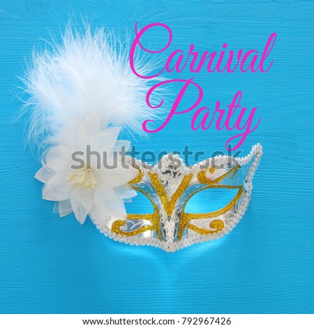 Top view image of masquerade venetian mask background. Flat lay