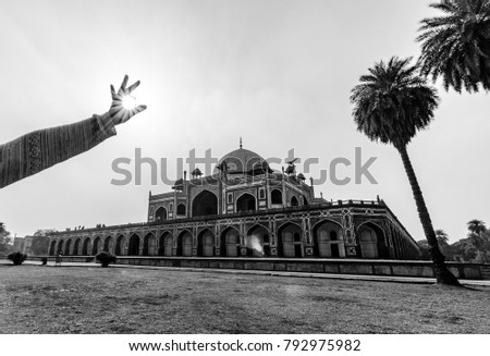 Humayun's Tomb in Delhi, India. The Humayun Tomb is also famous tourist place in Delhi. Locals also come to see this great Persian architecture marvel. Humayun Tomb is the last resting of the Emperor. Royalty-Free Stock Photo #792975982